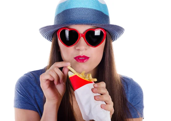 Woman eating fries potatoes — Stock Photo, Image