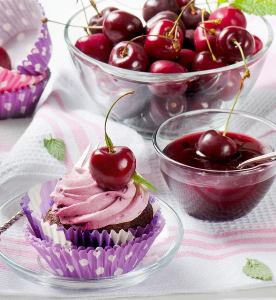 Cupcake with a cherry   jam. — Stock Photo, Image