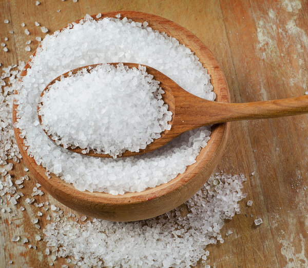 Sea salt in wooden bowl