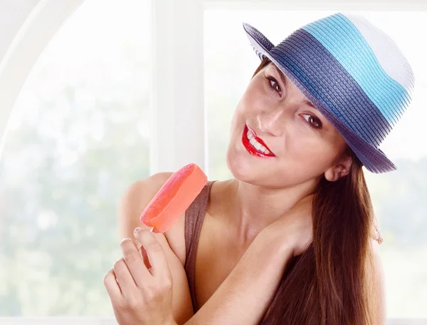 Young happy girl in  blue hat — Stock Photo, Image