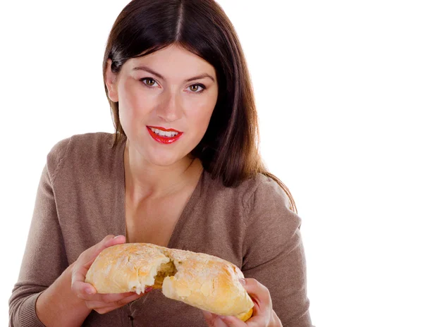 Woman holding homemade baked bread — Stock Photo, Image