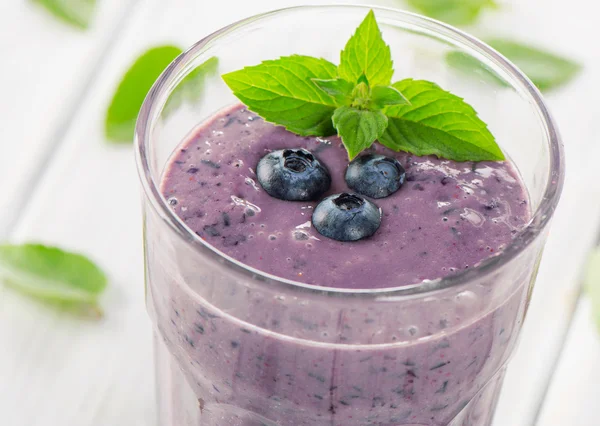 Glass of blueberry smoothie — Stock Photo, Image