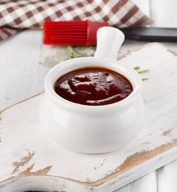BBQ sauce in a white bowl  clipart