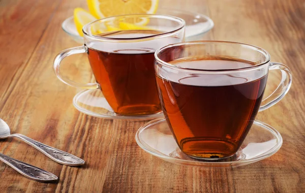 Tazas de vidrio de un té negro — Foto de Stock