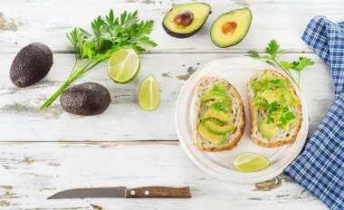 Homemade sandwiches  with a sliced avocado
