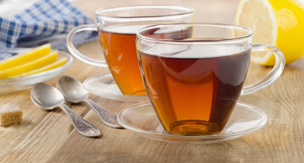 Glass cups of fresh black tea. — Stock Photo, Image