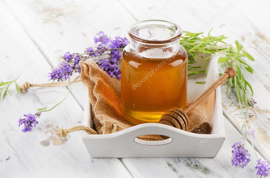 Glass jar of honey