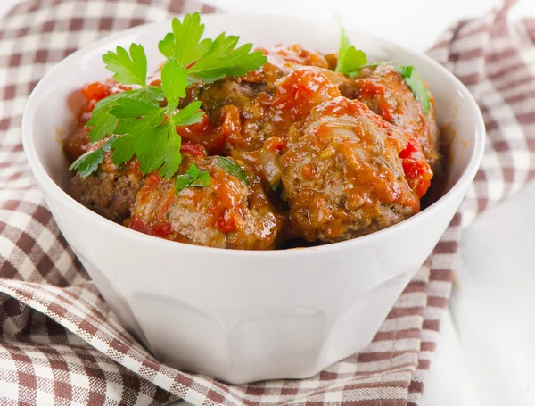 Meatballs with  fresh parsley leaves. — Stock Photo, Image