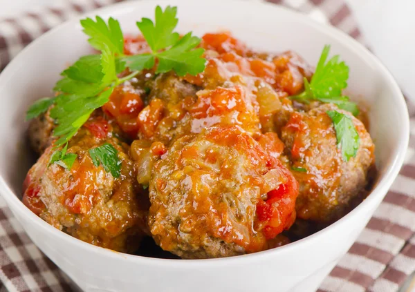 Meatballs with Tomatoes and fresh herbs. — Stock Photo, Image