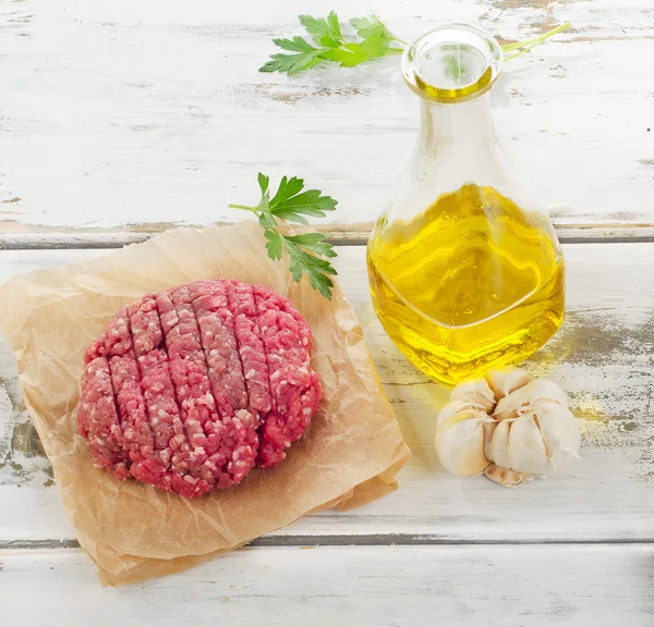 Raw ground beef patty. — Stock Photo, Image