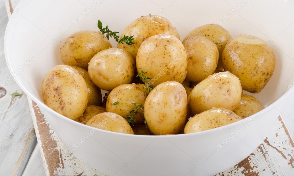 Raw potatoes with spices