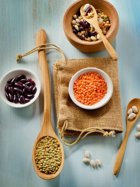 Beans and lentil on a wooden table