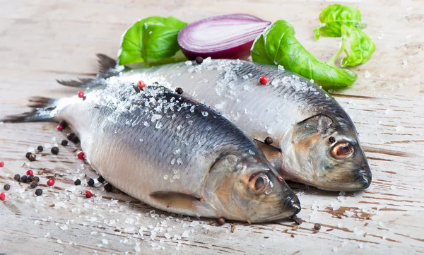 Herring on a wooden background. — Stock Photo, Image