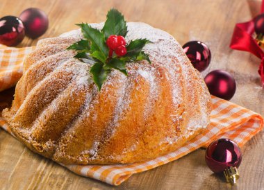 Tatlı Noel kek bir rustik ahşap tahta üzerinde.