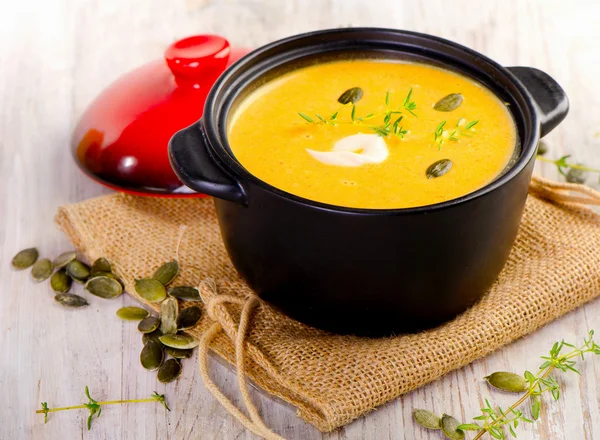 Pumpkin soup with herbs. — Stock Photo, Image