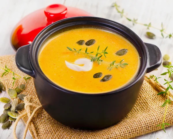 Pumpkin soup with herbs. — Stock Photo, Image