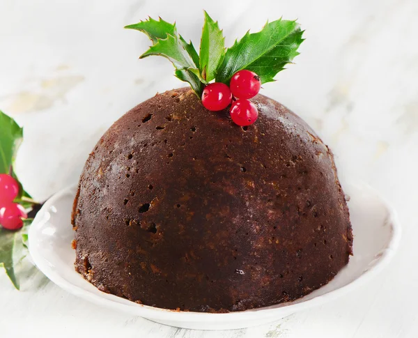 Christmas pudding met holly — Stockfoto