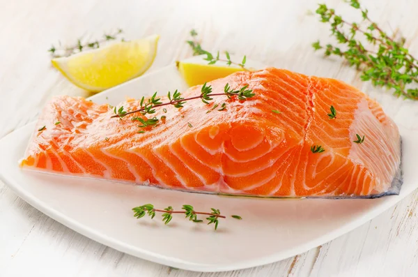 Salmon fillet on white plate — Stock Photo, Image