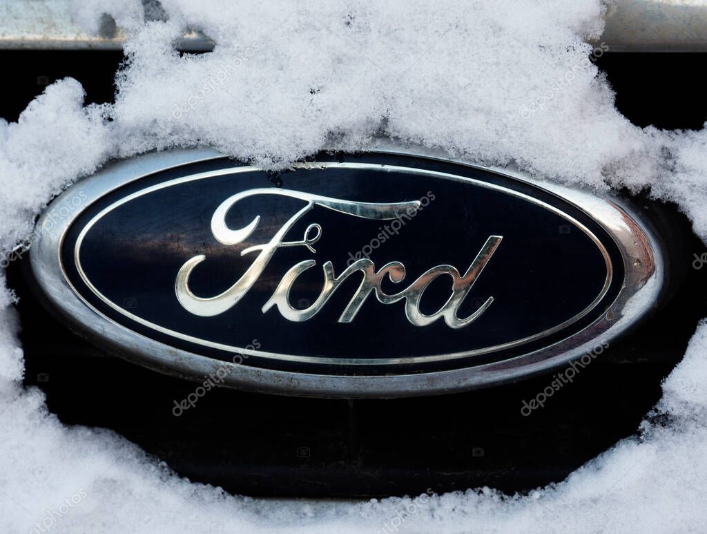KIEV, UKRAINE - January 31, 2021: Ford logo on snow-covered radiator