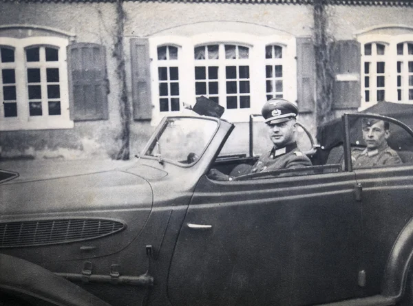 German officer posing in convertible — Zdjęcie stockowe