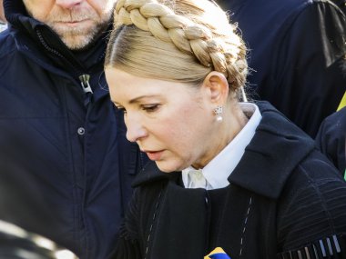 Yulia Tymoshenko lays flowers heroes clipart