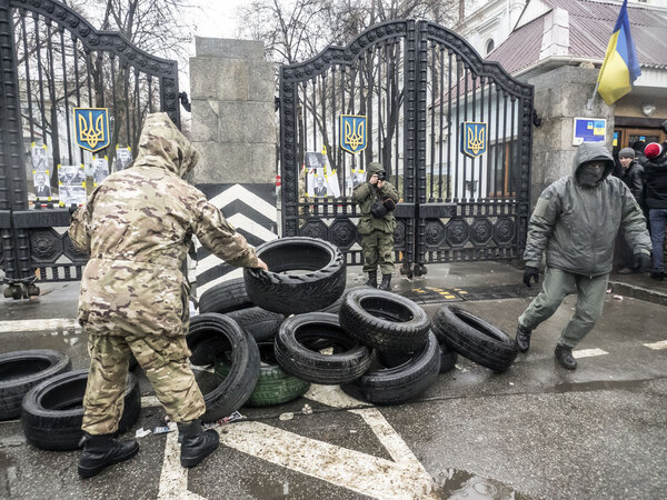 Protesters stacked pyramid of tires