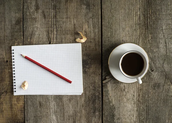 Paper spiral notebook and cup of coffee Royalty Free Stock Images