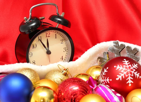 Retro clock and christmas balls and toys — Stock Photo, Image