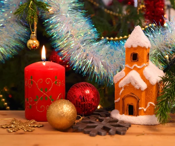 Candle, house, snowflakes and balls — Stock Photo, Image