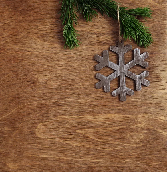 Christmas wooden background with snowflake — Stock Photo, Image