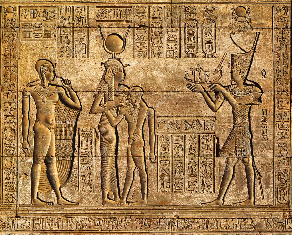 Hieroglyphic carvings in ancient egyptian temple Stock Photo by