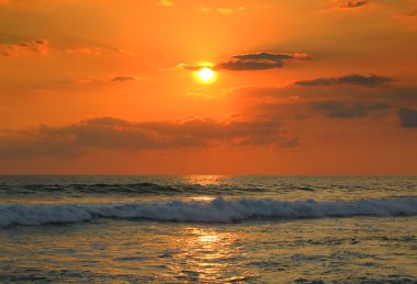 ropical sea sunset and waves clipart