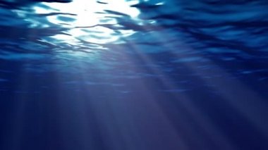 Sualtı üzerinden görülen mavi okyanus yüzeyinin