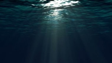 Sualtı üzerinden görülen mavi okyanus yüzeyinin