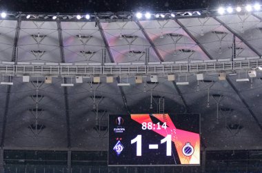 KYIV, UKRAINE - FEBRUARY 18, 2021: Final score of the UEFA Europa League game Dynamo Kyiv v Club Brugge seen on the scoreboard of NSK Olimpiyskiy stadium in Kyiv, Ukraine