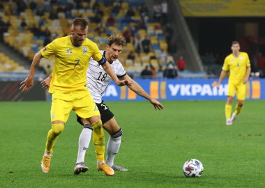 KYIV, UKRAINE - OCTOBER 10, 2020: UEFA Nations League game Ukraine v Germany at NSK Olimpiyskiy stadium in Kyiv. Andriy Yarmolenko of Ukraine (L) and Leon Goretzka of Germany. Germany won 2-1