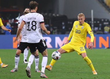 KYIV, UKRAINE - OCTOBER 10, 2020: UEFA Nations League game Ukraine v Germany at NSK Olimpiyskiy stadium in Kyiv. Leon Goretzka of Germany (L) and Viktor Kovalenko of Ukraine