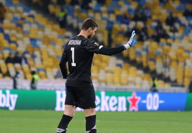KYIV, UKRAINE - 11 Mart 2021: Dinamo Kyiv 'in kalecisi Georgiy Bushchan, UEFA Avrupa Ligi maçında Kyiv' deki NSC Olimpiyskyi Stadyumu 'nda Villarreal' e karşı oynuyordu. Bushchan iki kez kaçırdı.