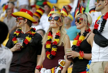 LVIV, UKRAINE - 17 Haziran 2012: Alman futbol taraftarları Lviv 'deki Lviv Arena' da oynanan UEFA EURO 2012 maçında desteklerini gösterdiler. Almanya 2-1 kazandı.