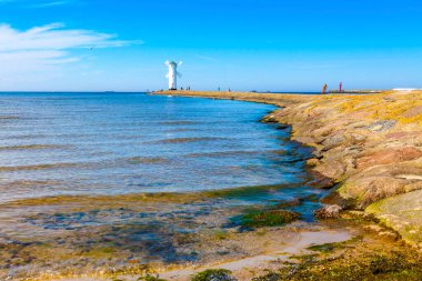 Stawa Mlyny, Swinoujscie, Batı Pomeranya Voyvoda, Kullanım Adası 'nda (deniz feneri) yel değirmeni şeklinde bir fener. 1873-1874 yılları arasında inşa edilmiş. 10 metre boyunda, beyaz ve siyah çatılı.