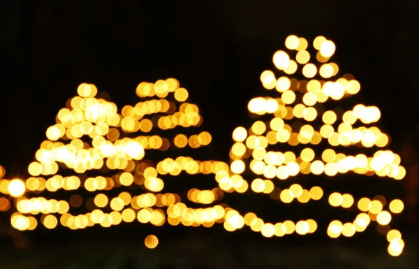 Alberi di Capodanno fatti da luci bokeh — Foto Stock