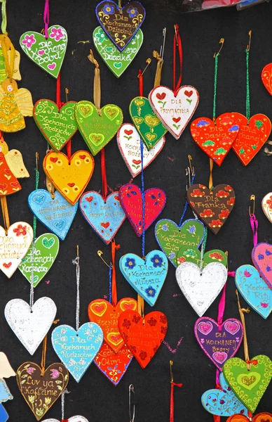 Close up small handmade hearts on a market stall — Stock Photo, Image