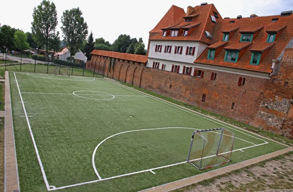 Little soccer field in Torun old town, Poland — Stockfoto