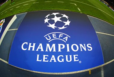 Board with UEFA Champions League Logo on the ground clipart