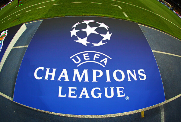 Board with UEFA Champions League Logo on the ground Stock Photo