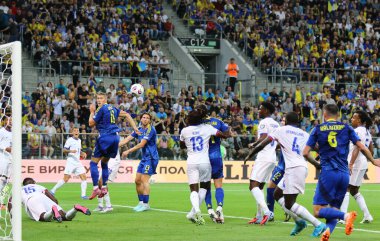 Wroclaw, Poland - September 5, 2025: Ukrainian (in Blue) and France players fight for a ball during their FIFA World Cup 2026 Qualifying round game at Tarczynski Arena in Wroclaw