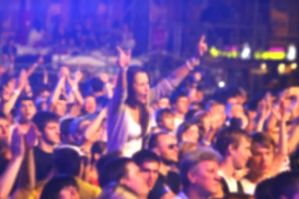 Blurred unrecognizable people dance during the concert — Stock Photo, Image