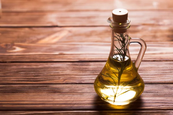 Oil with rosemary — Stock Photo, Image