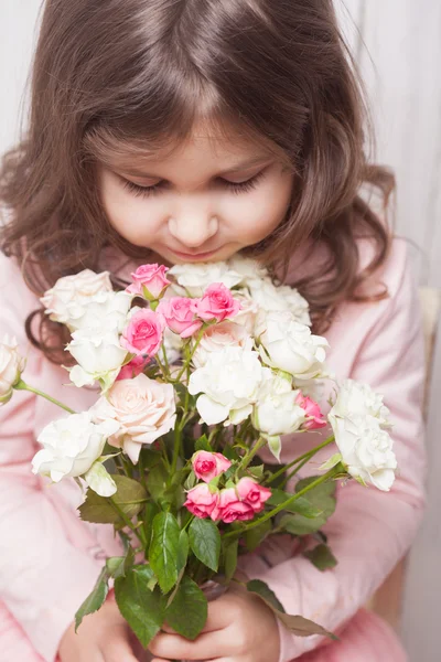 Girl with roses — Stock Photo, Image