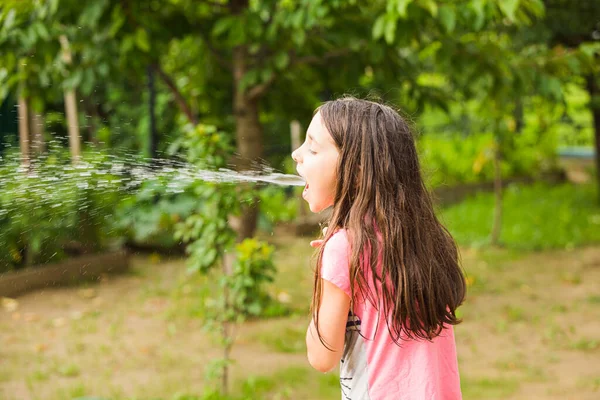 Funny pranks in the garden while summer holidays — Stock Photo, Image